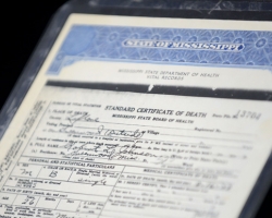 A certified death certificate for blues legend Robert Johnson is on display at the University of Mississippi's J.D. Williams Library throughout the summer. Johnson's poorly documented life and death gave rise to the myth that he sold his soul to the devil. UM photo by Nathan Latil.