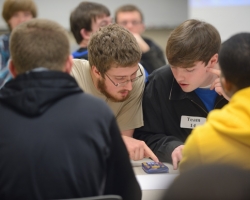 McNairy Central HS students Austin Reed and Corbin Kennedy work together during the team exam at the 2013 Engineering Day Competition.  29 teams participated from schools in Mississippi, Tennessee and Arkansas. Photo by Nathan Latil/Ole Miss Communications
