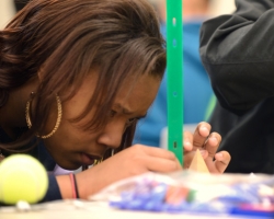 Jasmine Pearson of Callaway High School measures an object during the team activity portion of the 2013 Engineering Day Competition.  Photo by Nathan Latil/Ole Miss Communications
