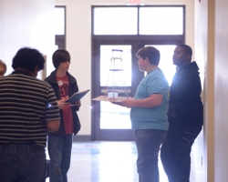 Students wait to enter the judging room for the water tower competition at the 2013 Engineering Day on campus.  Photo by Nathan Latil/Ole Miss Communications