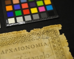 The barely legible signature suspected to be William Shakespeare's is at the upper right of the document, seen along with a color reference chart and ruler for the next round of image capture. UM photo by Robert Jordan.