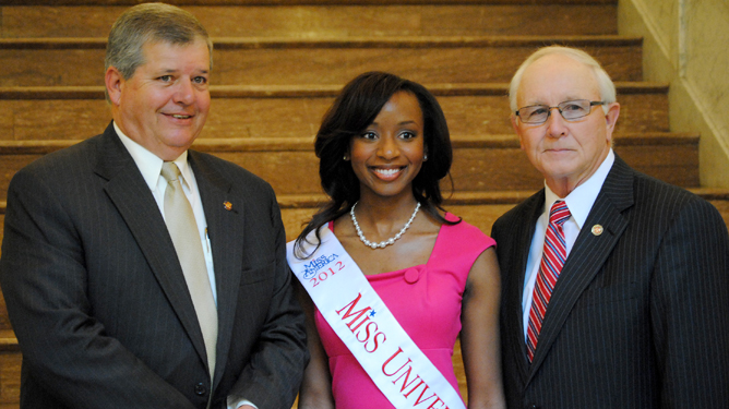msuniv-ip Miss University 2012 Kayla Snow poses with Sen. Russell Jolly of Houston (left) and Rep. Preston Sullivan of Okolona at the Capitol in Jackson.