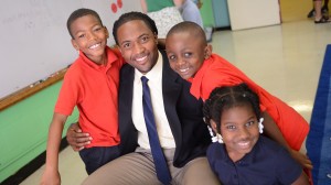 Principal Corps recruit Braxton Stowe visits with students at Quitman County Elementary School.