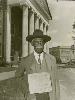 "Blind" Jim Ivy in front of the Lyceum at UM in this undated photo.