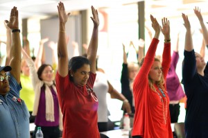 Staff members are treated to a free "desk yoga" class sponsored by RebelWell as part of Staff Appreciation Week.  Photo by Nathan Latil/Ole Miss Communications