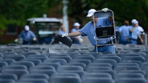 In this photo taken on Wednesday, May 9, 2012, UM Physical Plant employee Paul Goolsby helps set up chairs for graduation ceremonies that will be held in The Grove this Saturday, May 12.  Photo by UM Photographer Kevin Bain