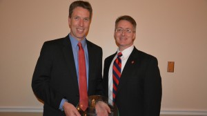 Dean David D. Allen (right) presents Jeffery Steevens with the Distinguished Alumnus of the Year award.