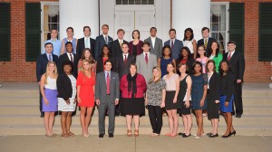 The McLean Institute's Catalyzing Entrepreneurship and Economic Development cohorts 1 and 2 on the steps of the Lyceum with Albert Nylander, director, and J.R. Love, CEED project manager. Photo by Robert Jordan 