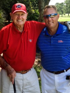 Dr. Gerald 'Doc' Hollingsworth (left), a longtime donor to UM athletics, spends time with head football coach Hugh Freeze.