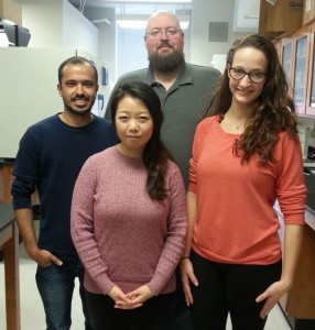 UM Biology Professor Patrick Curtis makes time for his graduate students in his laboratory.