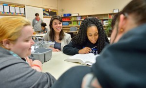 METP Fellow Emily Reynolds works with Team 36 students at Coffeeville High School.