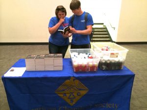 April Steen and Ryan Sessums (UM Chemistry and Biochemistry graduate students) participate in an ACS book club meeting.