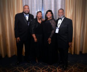 Tamara Crawford (second from right) surrounded by (from left) her brother, Kendrick Crawford; mother, Jeanelle Crawford; and father, Archie Crawford. 