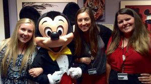 Heidi Bain with Mickey Mouse and two of her cowokers in the office.