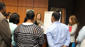 UM student Alex Fratesi and Right! from the Start Director Sannie Snell facilitate a "world cafe" discussion on factors associated with poor birth outcomes.