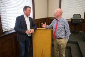 Shepard Smith, famed broadcast journalist and University of Mississippi alumnus, and Will Norton, dean of the School of Journalism and New Media, catch up on Friday (Oct. 18). Photo by Kevin Bain/Ole Miss Digital Imaging Services